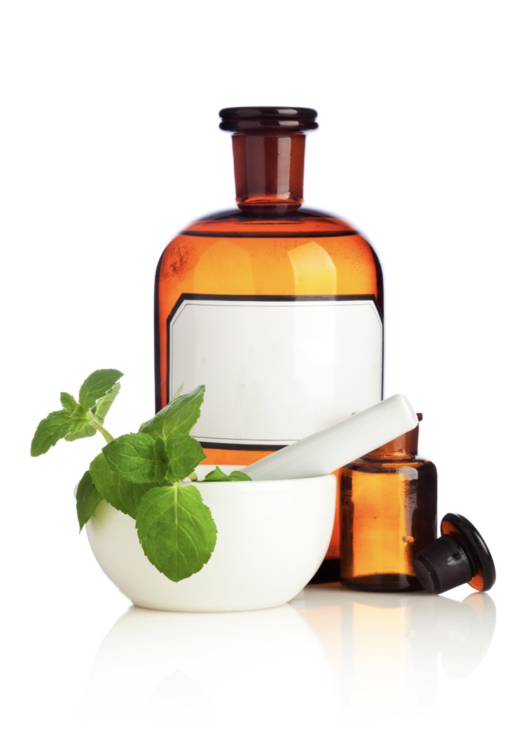 large and small amber herbal medicine bottles with white mortar and pestle